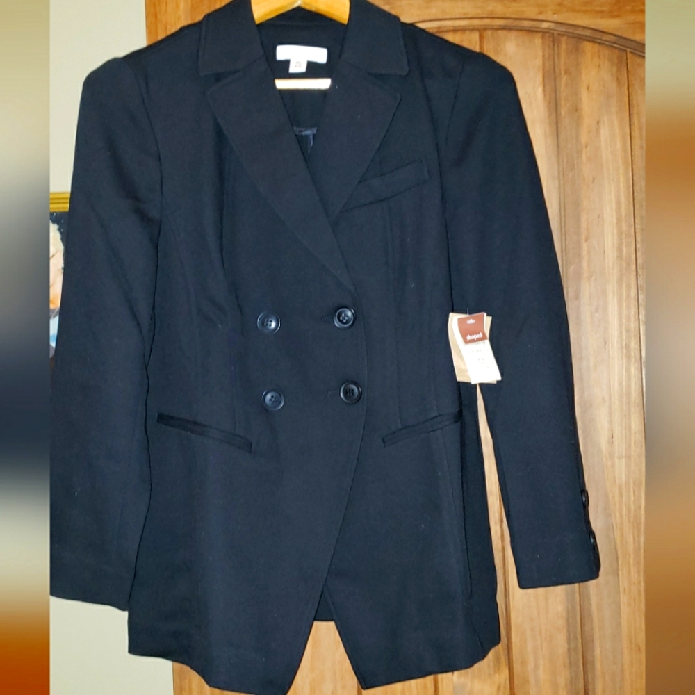 Ladies 14P shaped navy riding jacket.